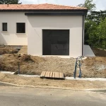 Entreprise de maçonnerie générale : construction d'un muret et installation d'un portail