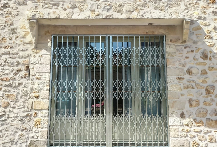 Grille accordéon extensible